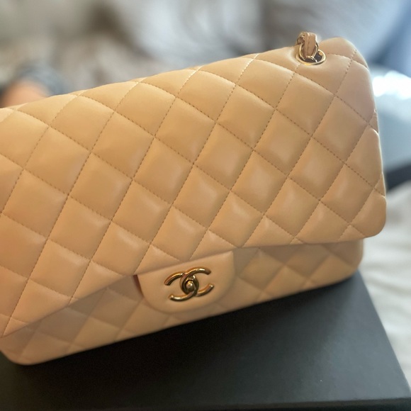 CHANEL Handbags - Brand new classic jumbo Chanel only used 1 time. Cream color